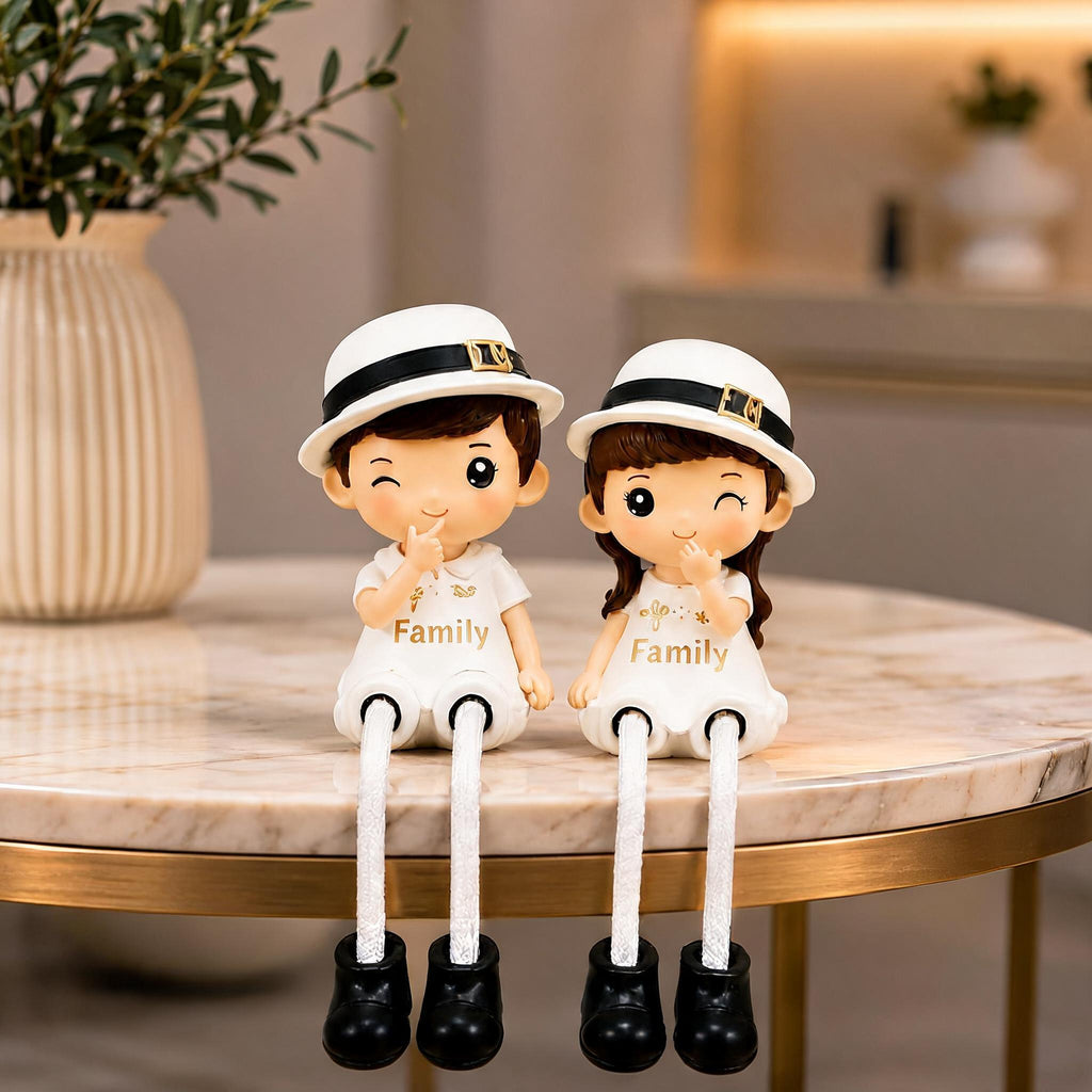 Polyresin Family Theme Hat Wearing Couple Showpiece