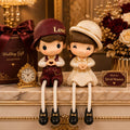 Polyresin Coordinated Outfits Hat Sitting Couple Showpiece
