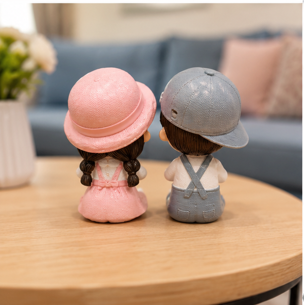Polyresin Pastel Hand Painted Sitting Couple Figurine